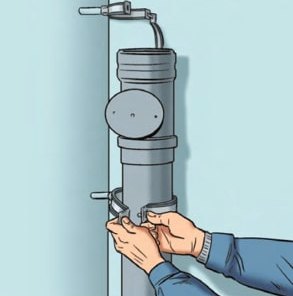 Крепление трубы к стене