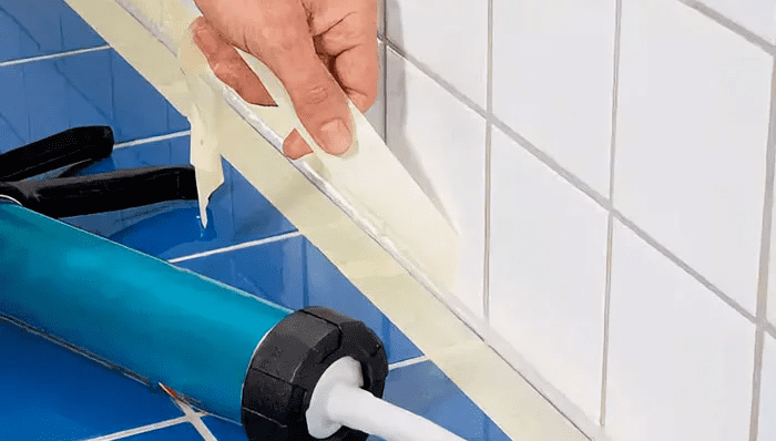 Удалить скотч с обеих сторон шва